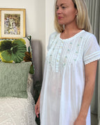 Betty nightgown in soft blue cotton voile, short sleeve with hand embroidered roses
