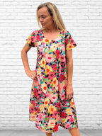 Rene pure cotton short sleeve, round neck, knee length dress in Flower salad print