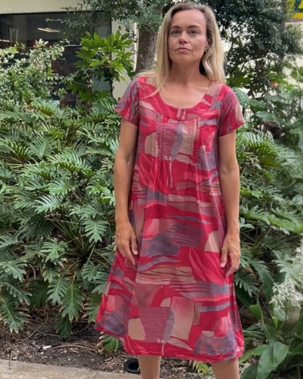 Rene pure cotton short sleeve, round neck, knee length dress in Red Multi geometric print