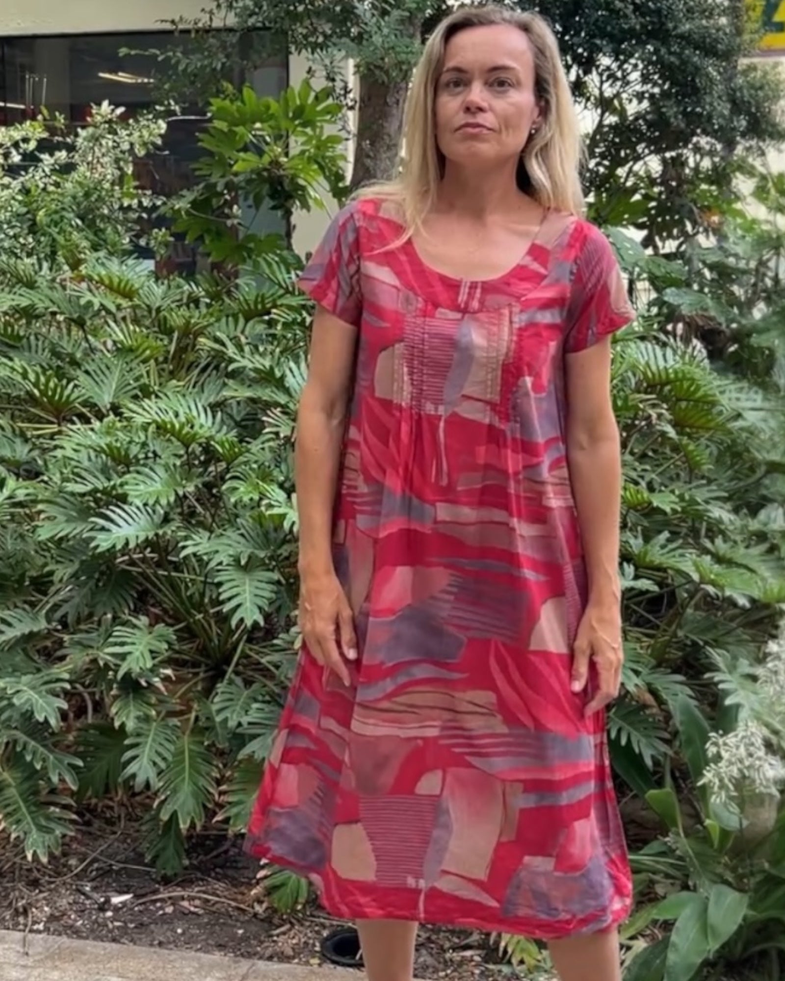 Rene pure cotton short sleeve, round neck, knee length dress in Red Multi geometric print