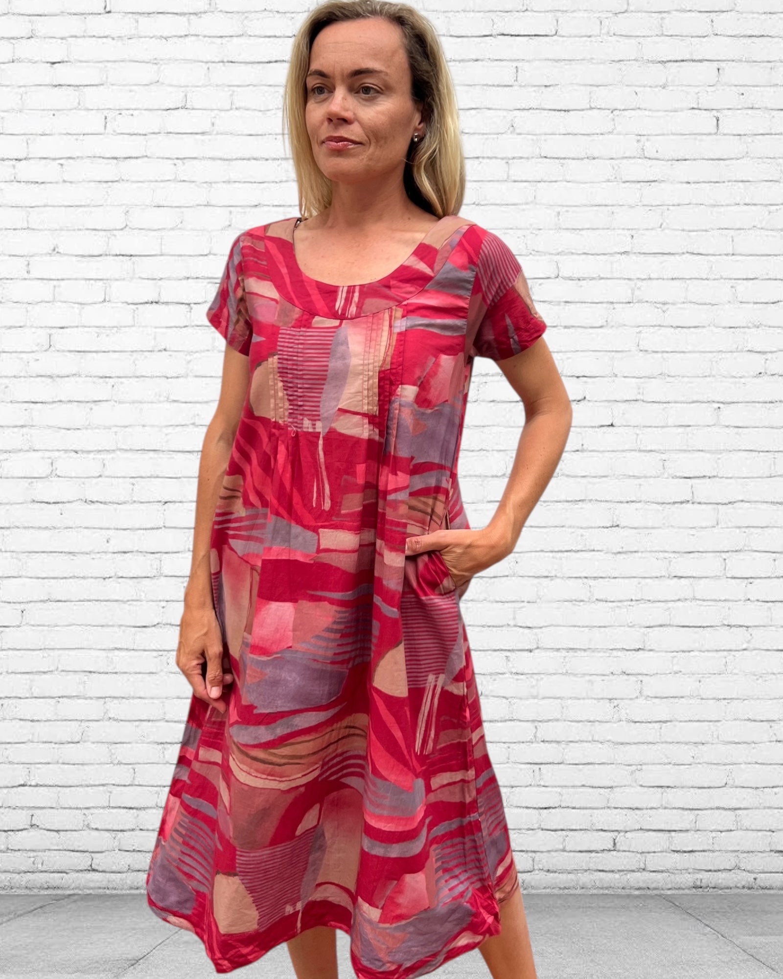 Rene pure cotton short sleeve, round neck, knee length dress in Red Multi geometric print