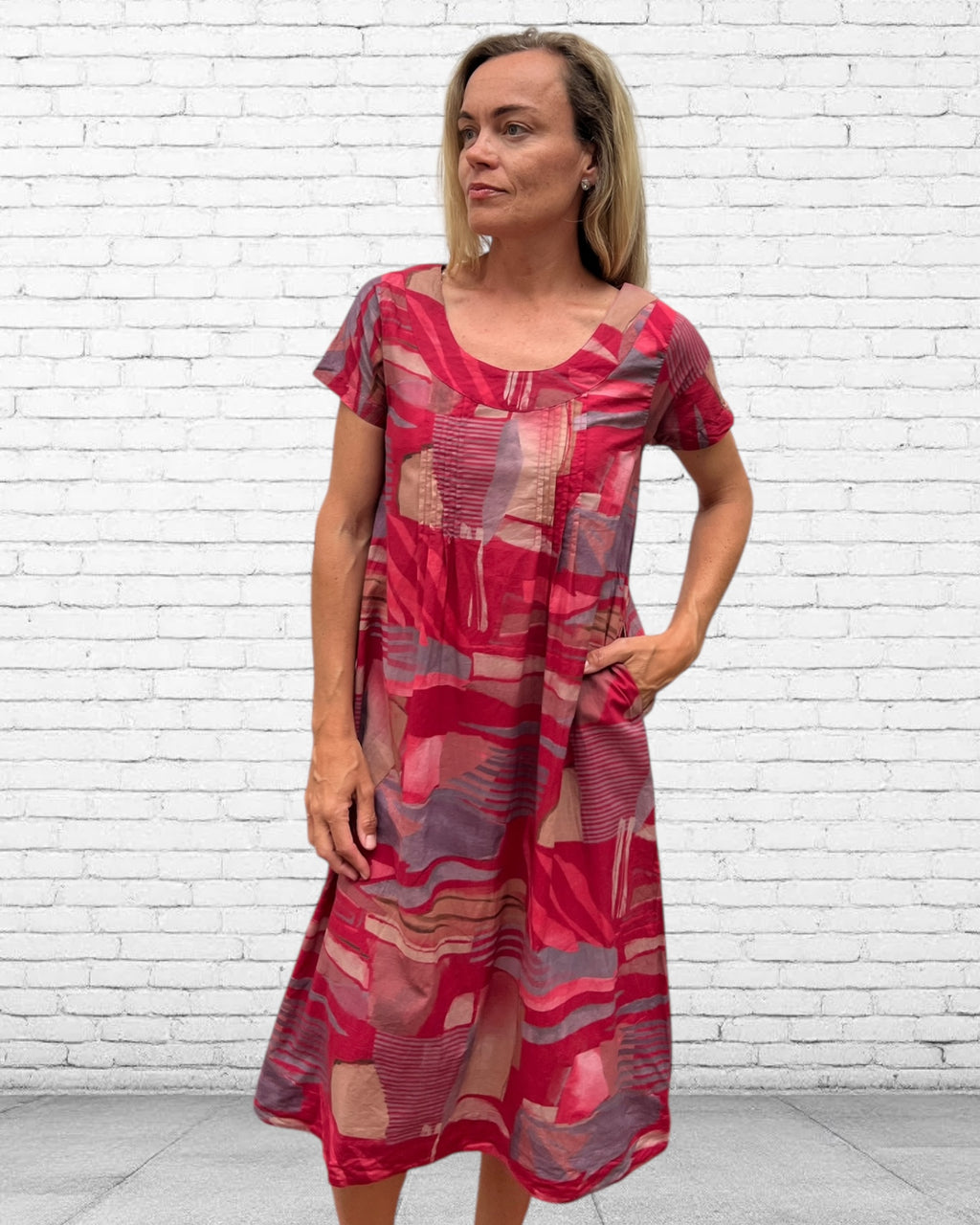 Rene pure cotton short sleeve, round neck, knee length dress in Red Multi geometric print