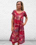 Rene pure cotton short sleeve, round neck, knee length dress in Red Multi geometric print