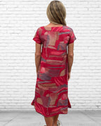Rene pure cotton short sleeve, round neck, knee length dress in Red Multi geometric print